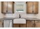 Farmhouse kitchen sink with gray countertops at 628 Ridge Rd, Dallas, GA 30157