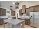 Modern kitchen with stainless steel appliances and island at 628 Ridge Rd, Dallas, GA 30157