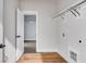 Convenient laundry room with closet and built-in shelving at 628 Ridge Rd, Dallas, GA 30157