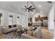 Open living room with vaulted ceiling, hardwood floors, and a view of the kitchen at 628 Ridge Rd, Dallas, GA 30157