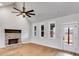 Living room with fireplace, vaulted ceiling and hardwood floors at 628 Ridge Rd, Dallas, GA 30157