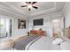 Main bedroom with a large bed, walk-in closet, and ensuite bathroom at 628 Ridge Rd, Dallas, GA 30157