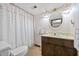 Basement bathroom with vintage vanity and shower/tub combo at 4316 Revere Cir, Marietta, GA 30062