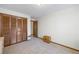 Well-lit bedroom with ample closet space and carpet flooring at 4316 Revere Cir, Marietta, GA 30062