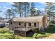 Back of house with deck and wooded view at 4316 Revere Cir, Marietta, GA 30062