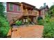 Spacious deck with stairs, leading to a landscaped backyard at 50 Highcrest Dr, Acworth, GA 30101