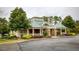 Community clubhouse with stone accents and a green roof at 50 Highcrest Dr, Acworth, GA 30101