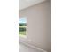 Bright bedroom with neutral walls, plush carpeting, and large windows offering views of the outdoors at 123 Cherry Glen Way, Euharlee, GA 30145