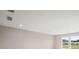 A bright empty room featuring neutral walls and large bright windows at 123 Cherry Glen Way, Euharlee, GA 30145