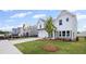 Traditional two-story home featuring a manicured lawn and a concrete driveway, in a developing community at 123 Cherry Glen Way, Euharlee, GA 30145