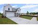 Traditional two-story home featuring a manicured lawn, concrete driveway and classic color scheme at 123 Cherry Glen Way, Euharlee, GA 30145