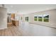 Bright kitchen featuring an island with a sink, light wood cabinetry and stainless steel appliances at 123 Cherry Glen Way, Euharlee, GA 30145