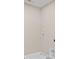 A utility sink sits on the floor near the wall hookups in the laundry room at 123 Cherry Glen Way, Euharlee, GA 30145
