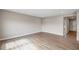 Spacious living room with hardwood floors and neutral paint, providing a blank canvas at 123 Cherry Glen Way, Euharlee, GA 30145