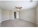 Spacious bedroom with ceiling fan and carpet at 1421 Bay Overlook Dr, Woodstock, GA 30188