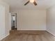 Spacious bedroom with neutral walls and carpet, and access to hallway at 2599 Browns Mill Se Rd, Atlanta, GA 30354