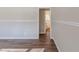 Spacious bedroom with hardwood floors and access to bathroom at 2599 Browns Mill Se Rd, Atlanta, GA 30354