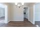 Simple dining room with hardwood floors and a chandelier at 2599 Browns Mill Se Rd, Atlanta, GA 30354