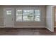Living room entryway with hardwood floors and neutral walls at 2599 Browns Mill Se Rd, Atlanta, GA 30354
