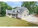 White home with large backyard and detached garage at 590 Clubwood Ct, Marietta, GA 30068