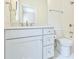 Clean bathroom with white vanity and neutral tile floors at 590 Clubwood Ct, Marietta, GA 30068