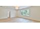 Bright bedroom with hardwood floors and large window at 590 Clubwood Ct, Marietta, GA 30068