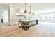 Spacious kitchen featuring an island and white cabinetry at 590 Clubwood Ct, Marietta, GA 30068