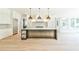 Bright kitchen with island, stainless steel appliances, and hardwood floors at 590 Clubwood Ct, Marietta, GA 30068