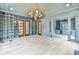 Spacious library with built-in bookshelves, hardwood floors, and French doors at 590 Clubwood Ct, Marietta, GA 30068