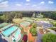 Resort-style pool and clubhouse with tennis courts nearby at 590 Clubwood Ct, Marietta, GA 30068