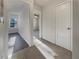 Hallway with neutral carpet leading to other rooms within the home at 555 Bridge Ave, Forest Park, GA 30297
