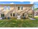 Home backyard with well-maintained lawn, energy-efficient HVAC systems and multiple windows for natural light at 3603 Brycewood Dr, Decatur, GA 30034