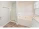 Bathroom features a shower/tub combo and white vanity at 850 Oxford Hall Dr, Lawrenceville, GA 30044