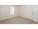 Well-lit bedroom with carpet and double door closet at 850 Oxford Hall Dr, Lawrenceville, GA 30044