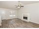 Spacious living room with fireplace and hardwood floors at 850 Oxford Hall Dr, Lawrenceville, GA 30044