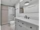 Modern bathroom with walk-in shower and updated vanity at 860 Peachtree Ne St # 1617, Atlanta, GA 30308