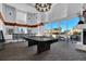 Residential game room with pool table, seating, and city views at 860 Peachtree Ne St # 1617, Atlanta, GA 30308