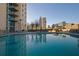 Relaxing rooftop pool with city views and plenty of lounge chairs at 860 Peachtree Ne St # 1617, Atlanta, GA 30308