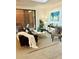 Bright living room with comfortable seating, stylish decor, and sliding glass doors to outdoor patio at 972 Dekalb Ne Ave # 203, Atlanta, GA 30307