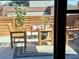 Cozy outdoor patio area with comfortable seating, a small table, and a decorative rug with greenery at 972 Dekalb Ne Ave # 203, Atlanta, GA 30307