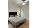 Bedroom with large window and ceiling fan at 1217 Eagles Nest Cir, Carrollton, GA 30116