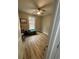 Bright bedroom with light wood-look flooring and a large window at 1217 Eagles Nest Cir, Carrollton, GA 30116