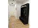 Light and bright hallway with built-in bench and shoe storage at 1217 Eagles Nest Cir, Carrollton, GA 30116