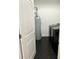 Laundry room with washer, dryer, and water heater at 1217 Eagles Nest Cir, Carrollton, GA 30116