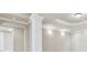 Elegant basement with columns and recessed lighting at 3352 Forest Vista Dr, Dacula, GA 30019