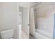 Bathroom with shower/tub combo and updated tile at 3352 Forest Vista Dr, Dacula, GA 30019