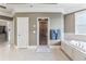 Bathroom with a large soaking tub, walk-in shower, and access to the closet at 3352 Forest Vista Dr, Dacula, GA 30019