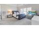 Spacious bedroom with plush carpeting and large windows at 3352 Forest Vista Dr, Dacula, GA 30019