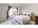 Bright bedroom with a comfortable bed and neutral decor at 3352 Forest Vista Dr, Dacula, GA 30019