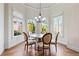 Charming breakfast nook with a round table and four chairs, offering natural light at 3352 Forest Vista Dr, Dacula, GA 30019